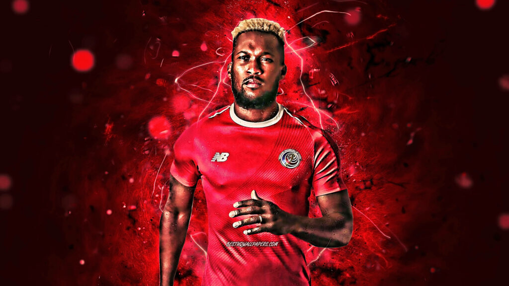 Kendall Waston Costa Rica football player in red kit on dynamic red abstract background wallpaper