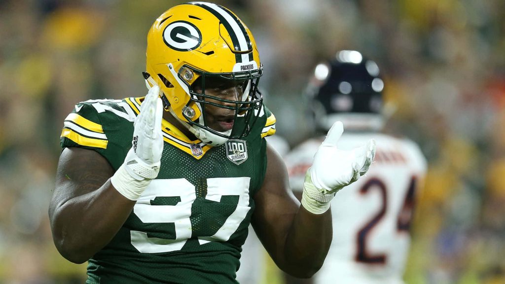 Kenny Clark Green Bay Packers defensive tackle intense action vs Chicago Bears NFL game wallpaper