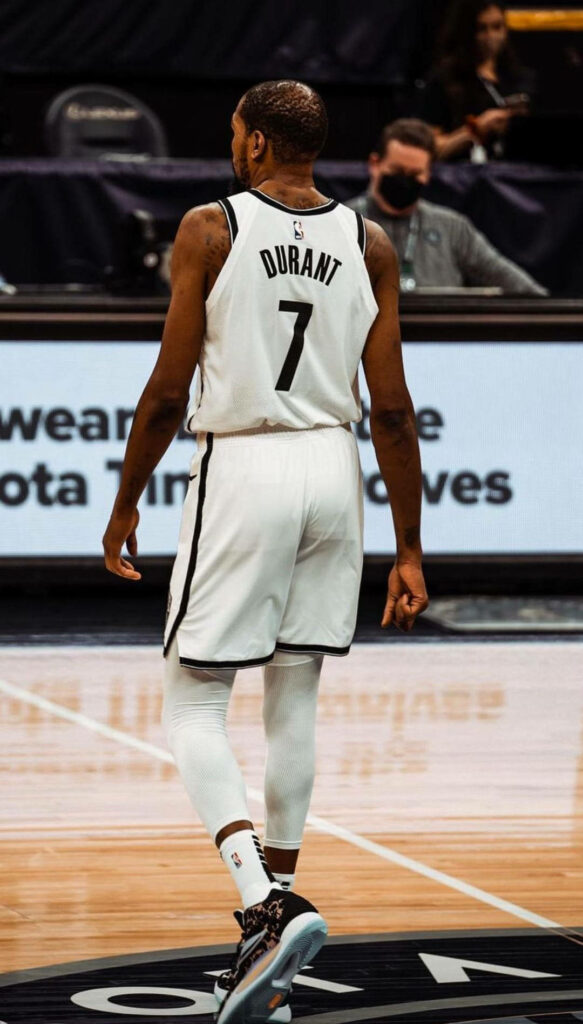 Kevin Durant Cool Wallpaper: Iconic #7 on Court Background
