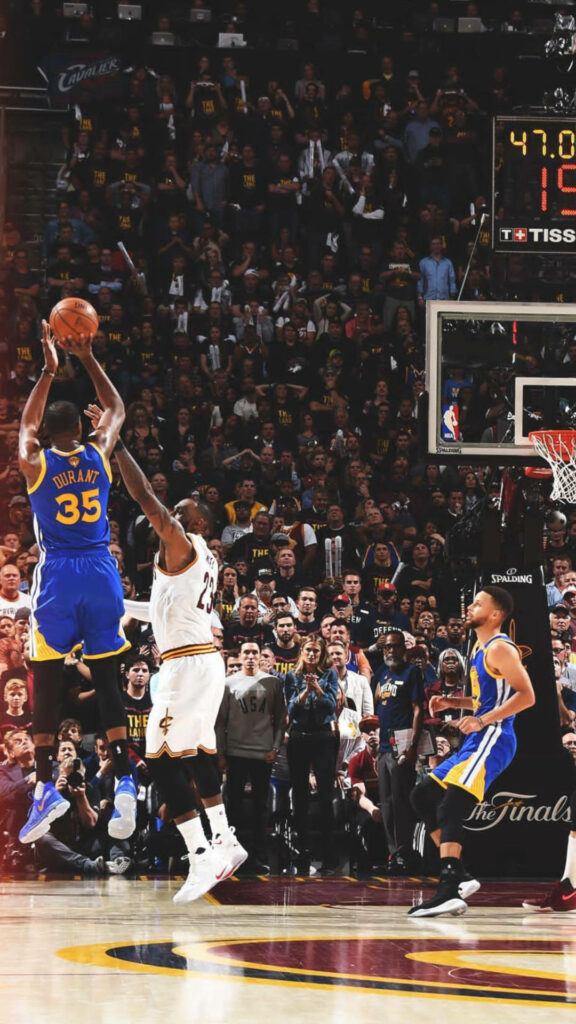 Kevin Durant Mid-Air Shot: Intense Basketball Wallpaper Background