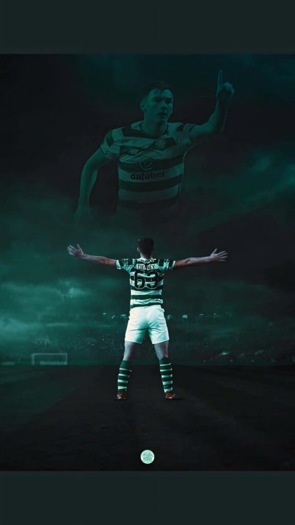 Kieran Tierney Celtic FC celebrating with arms outstretched green tones and iconic hoops background Wallpaper