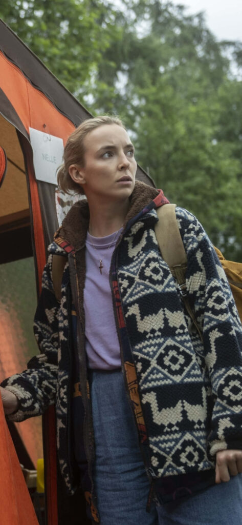 Stylish Killing Eve Character in Patterned Jacket - Nature Wallpaper