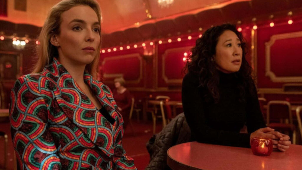 Stunning Killing Eve Wallpaper: Dramatic Red Theatre Scene Background