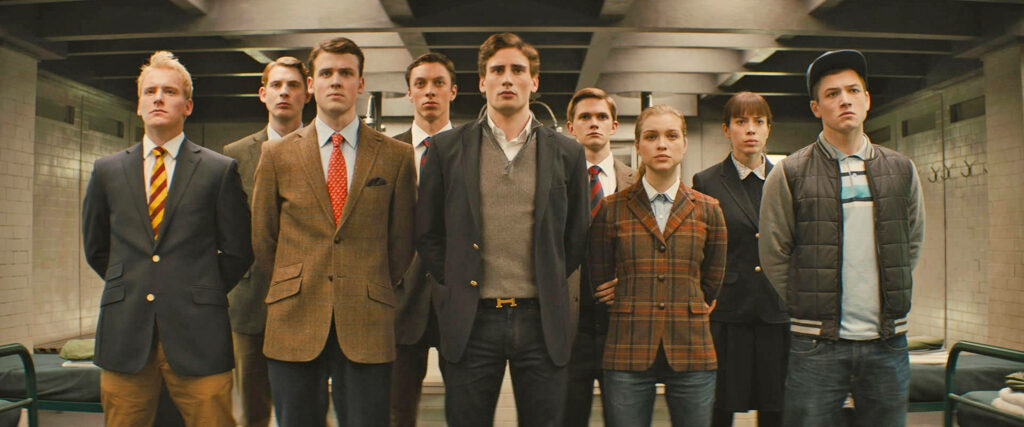 Young candidates in varied styles line up in training room for Kingsman The Secret Service selection Wallpaper