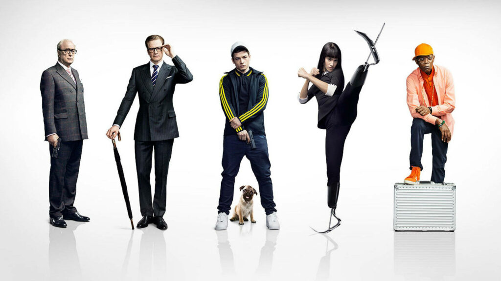 Kingsman The Secret Service main characters lined up in stylish suits on white background wallpaper