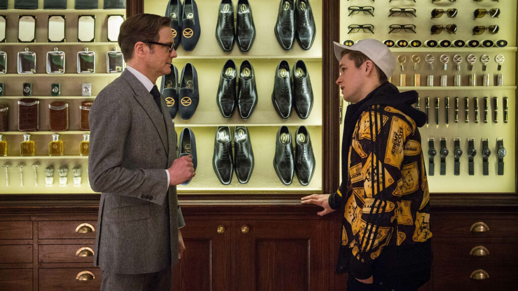 Kingsman wallpaper with Taron Egerton and Colin Firth in sharp suits and streetwear in stylish shop