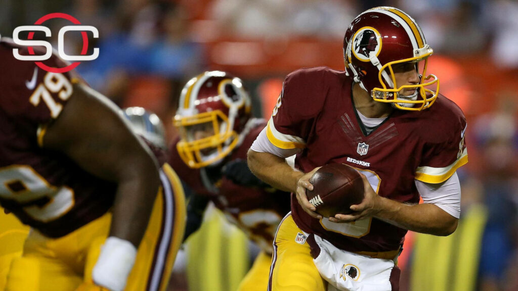 Dynamic Wallpaper: Kirk Cousins in Action - Focused Football Skills