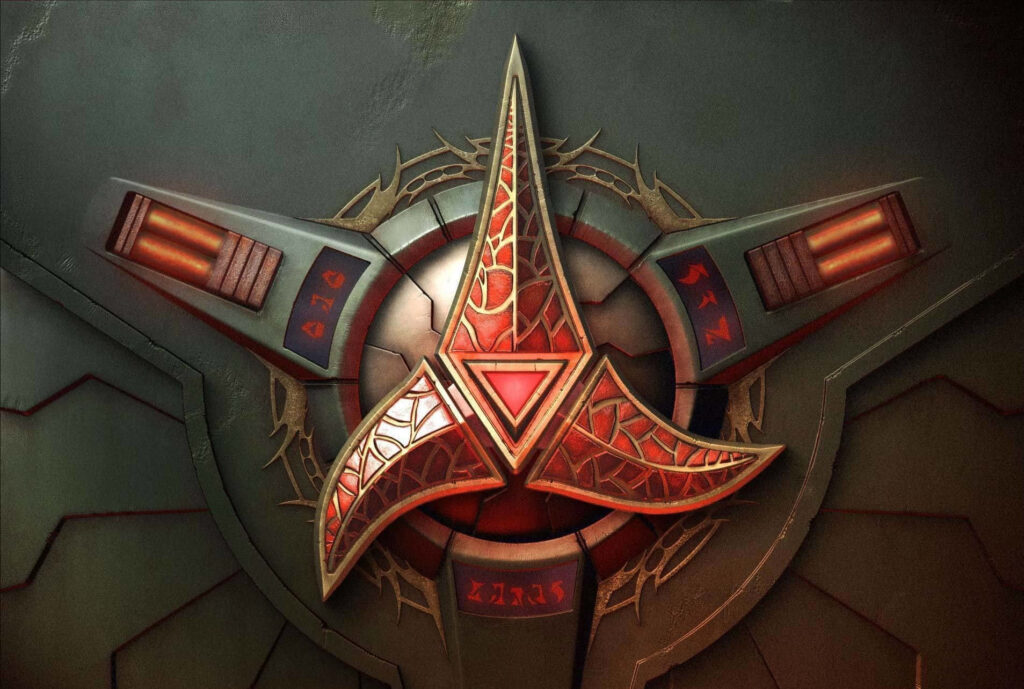 Klingon Emblem Wallpaper: Intricate Red & Gold Design Background