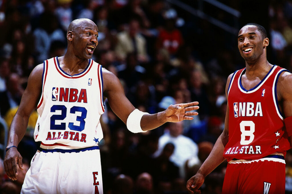 The Ultimate Duo: Reliving the NBA Legends Kobe Bryant and Michael Jordan in an All-Star Showdown Wallpaper