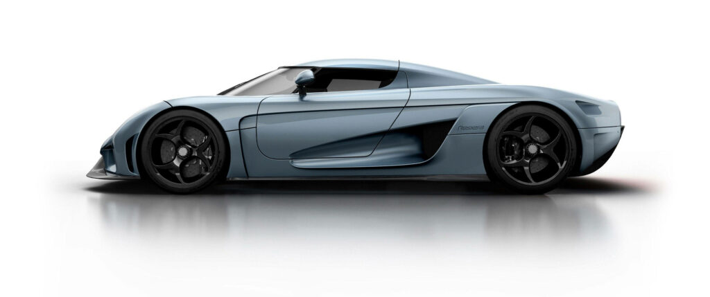 Koenigsegg Regera sleek metallic sports car with aerodynamic design on white background wallpaper