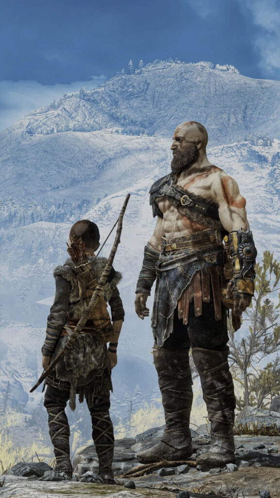 Kratos & Atreus: Stronger Together in a Majestic Snowy Wallpaper