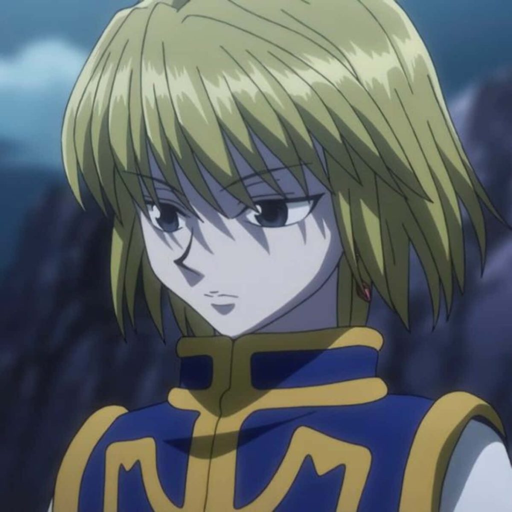 Kurapika close-up Hunter x Hunter wallpaper serious expression blonde hair blue gold attire