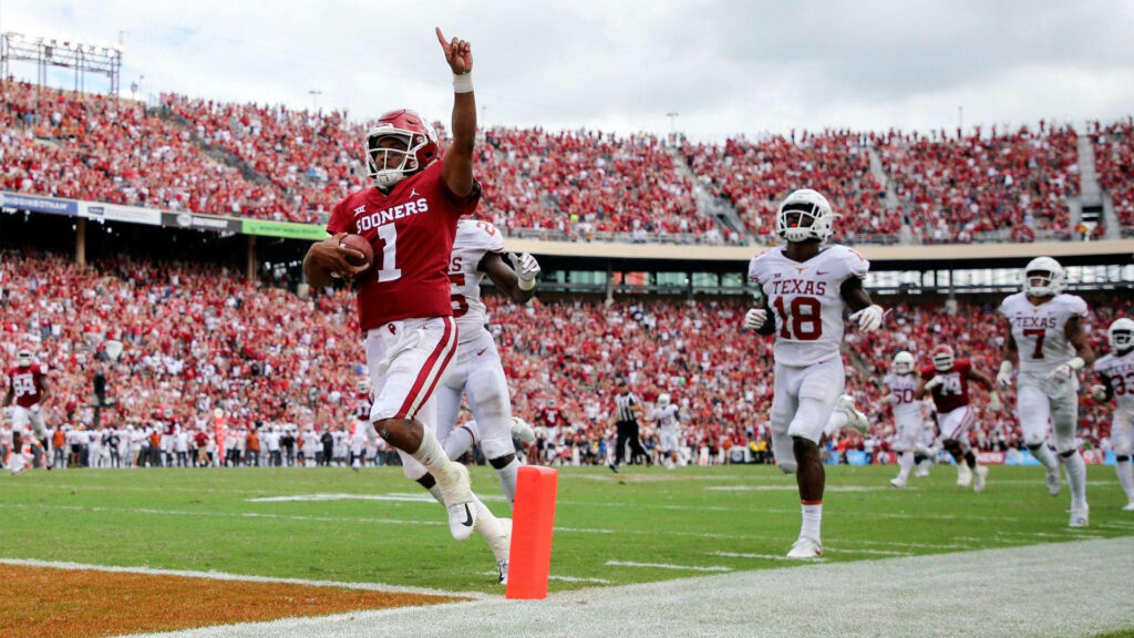 Dynamic Kyler Murray Wallpaper: Touchdown in Energetic Stadium