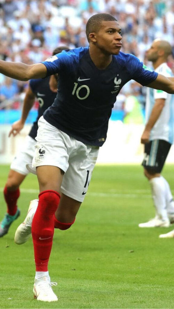 Kylian Mbappe: Passionate Celebration Wallpaper for Dynamic Fans