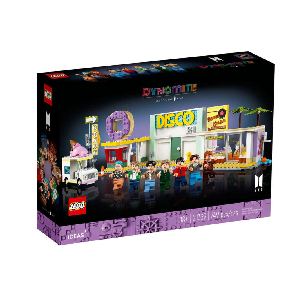 LEGO Ideas BTS Dynamite set with detailed minifigures vibrant street scene record shop and stage Wallpaper
