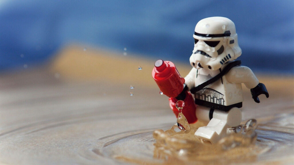 Playful LEGO Star Wars Stormtrooper Wallpaper Background
