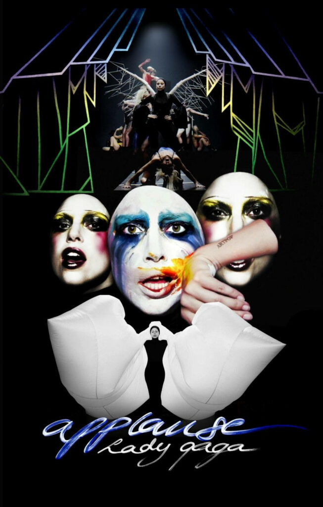 Lady Gaga Applause poster wallpaper with iconic face paint and theatrical costume design