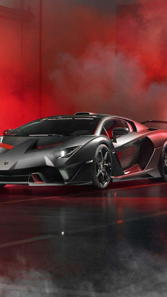 Lamborghini sports car with swirling red smoke background dramatic powerful phone wallpaper