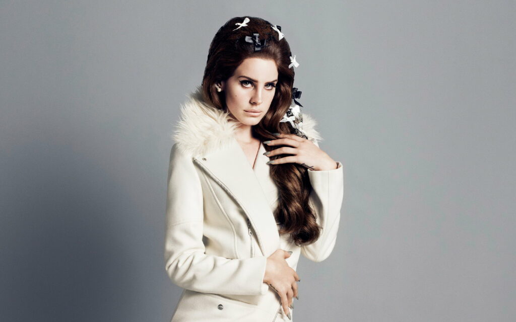 Lana Del Rey's Enchanting Portrait in a Stunning 4K Wallpaper: Timeless Beauty in a White Coat