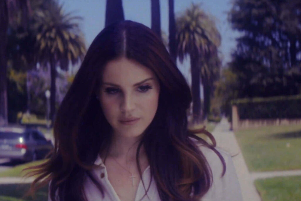 Lana Del Rey Serene Outdoor Wallpaper: Vintage Palm Tree Aesthetic