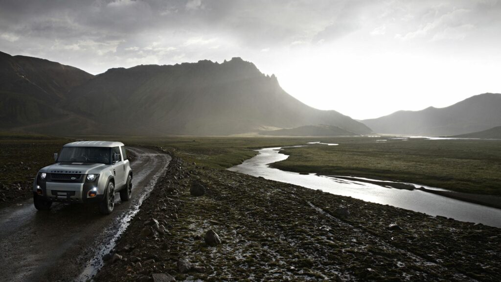 Land Rover DC100 SUV in Rugged Landscape Wallpaper 1920x1080