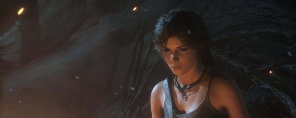Mysterious Depths: Lara Croft's Enigmatic Gaze in a Mesmerizing 3440x1440p Rise Of The Tomb Raider Background Wallpaper