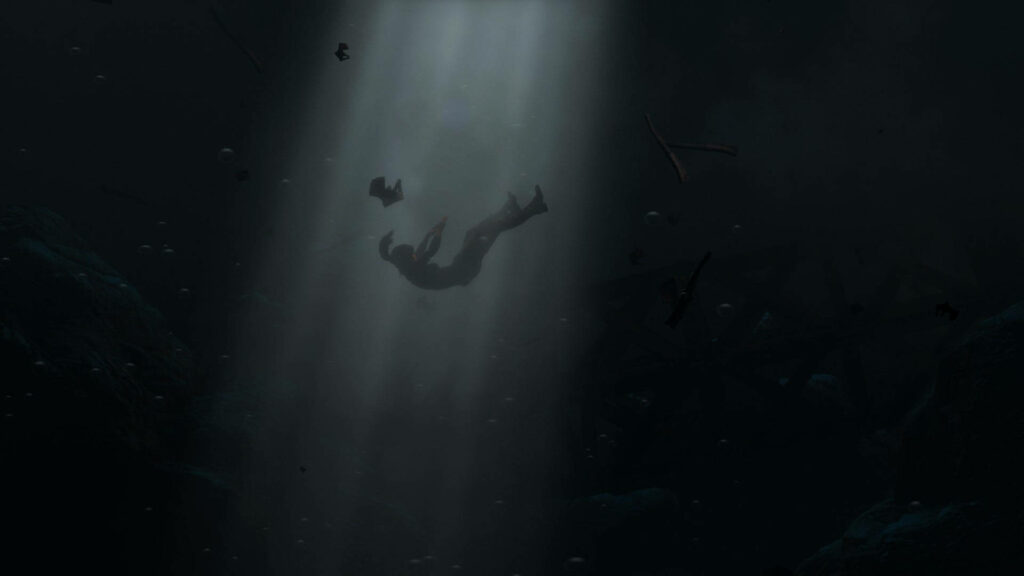 Sinking into the Abyss: Lara Croft's Watery Plunge captured in a Monochrome Snapshot Wallpaper