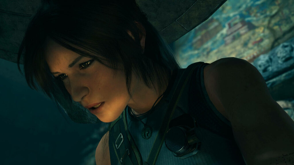 Anguished Lara Croft beautifully emerges from ancient stone in Shadow of the Tomb Raider: A Gripping Close-Up Wallpaper