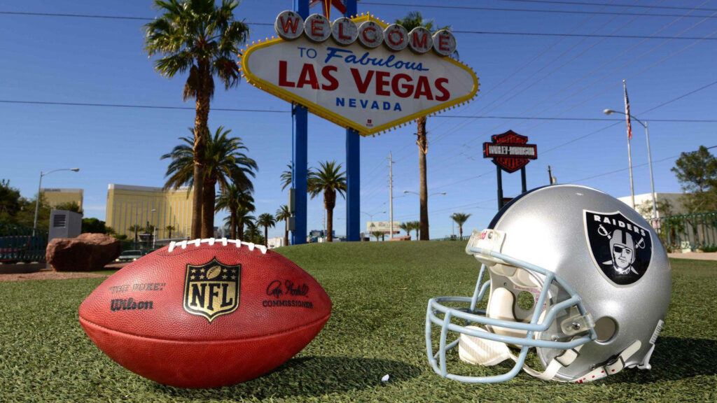 Las Vegas Raiders Wallpaper: Iconic Welcome Sign & Football Helmet