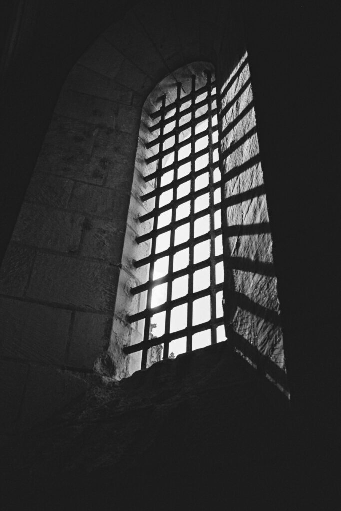 Elegant Black and White Wallpaper: Lattice Window Shadows Background