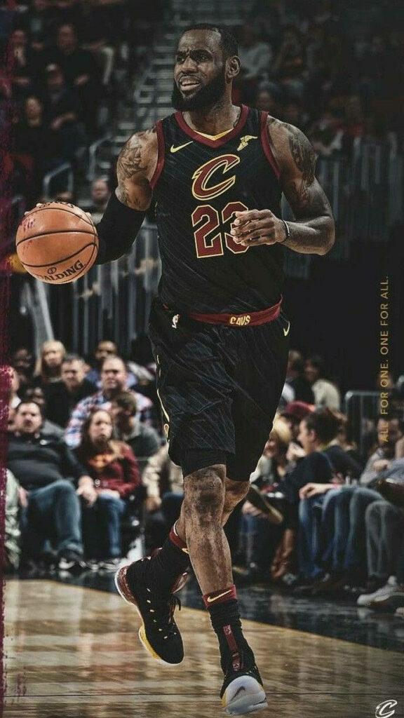 LeBron James in Action: Vibrant Cleveland Cavaliers Wallpaper