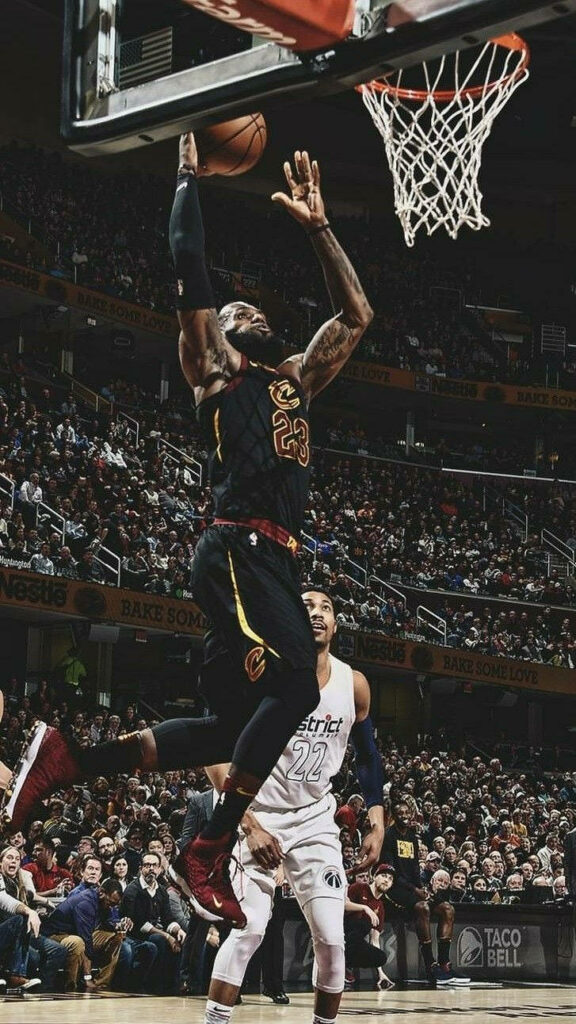 LeBron James Soars: Dynamic Dunk Wallpaper Background
