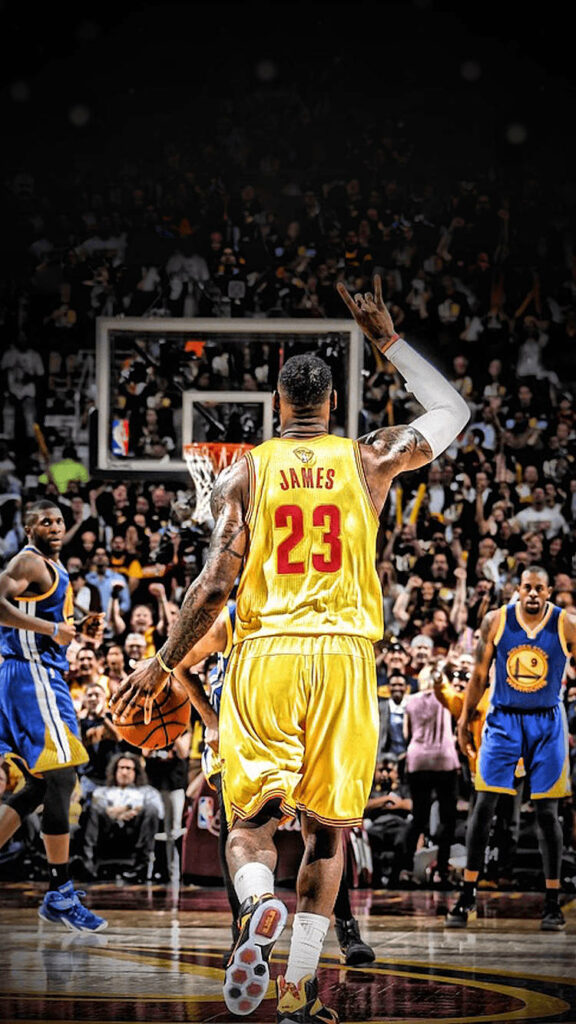 LeBron James Iconic Jersey Wallpaper: Signature Hand Sign & Cheering Crowd