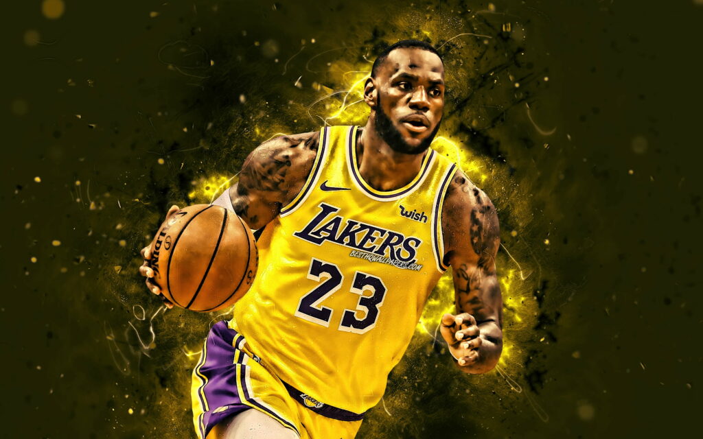LeBron James: Illuminating the NBA in his Dynamic Lakers' Yellow Uniform Wallpaper