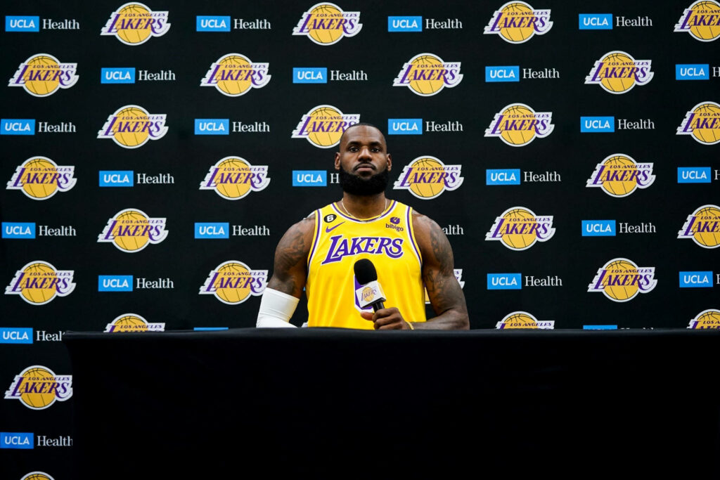 LeBron James Lakers Wallpaper: Vibrant Press Conference Backdrop