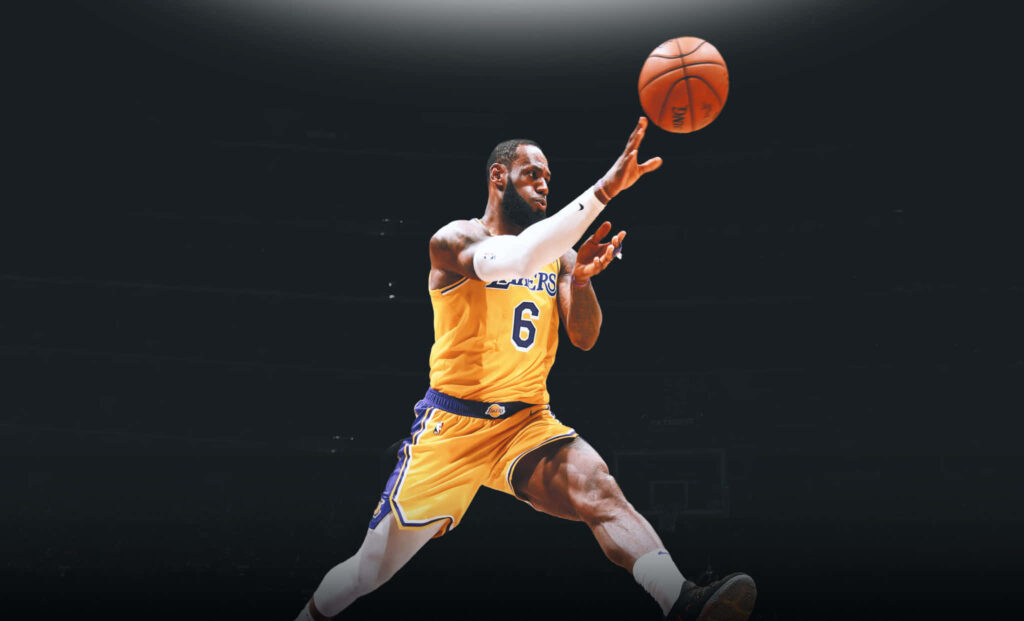 LeBron James Soars: A Wallpaper of Masterful Passing