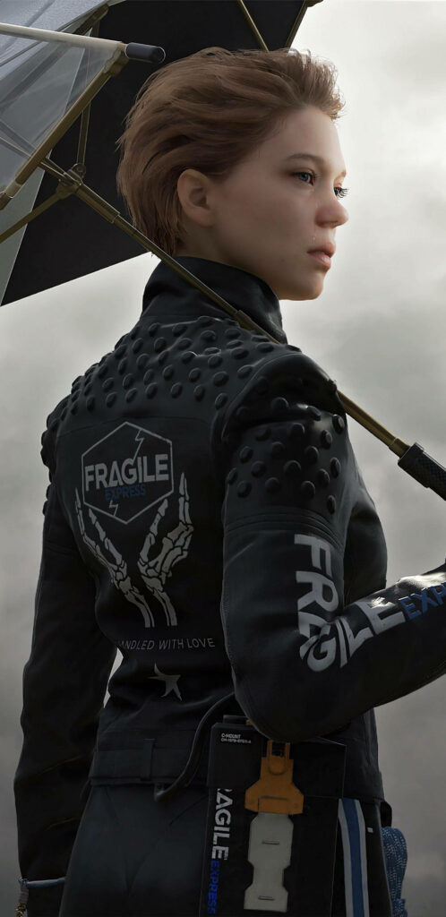 Lea Seydoux as Fragile in Death Stranding holding umbrella wearing detailed jacket misty background Wallpaper