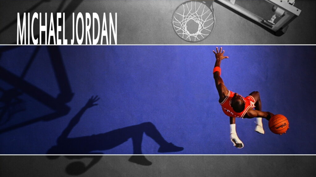 Michael Jordan Slam Dunk: Celebrating Basketball Icon with Stylish Wallpaper