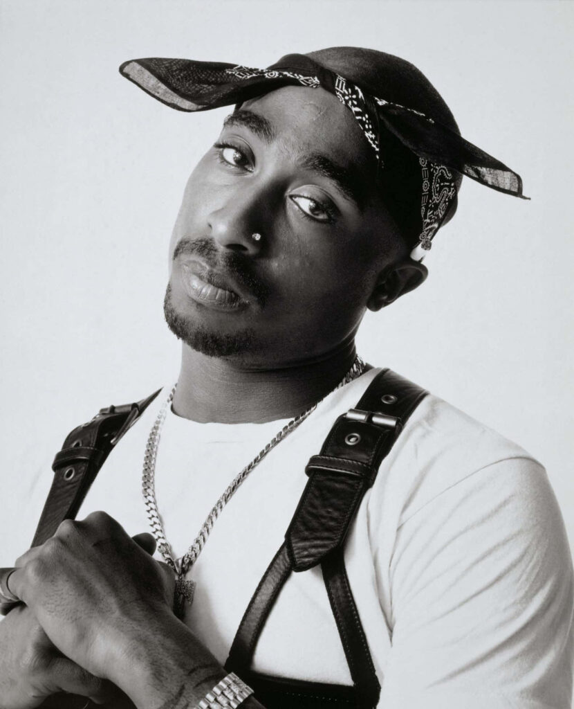 Resonating Legacy: Tupac Shakur's Timeless Influence Captured in Monochrome reverie Wallpaper