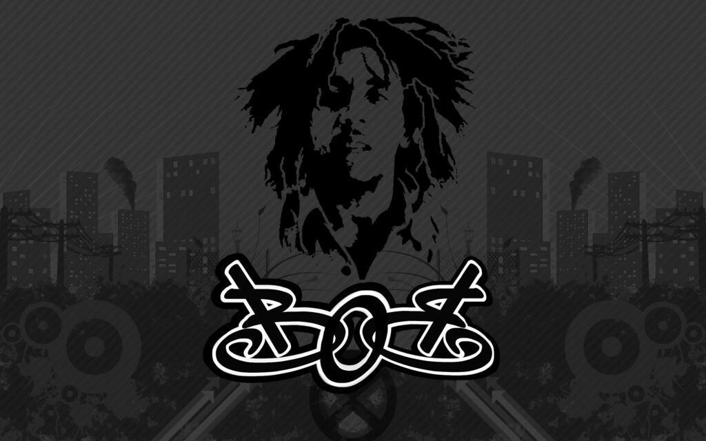 Jamaican Rasta Vibes: Bob Marley and the Reggae Wailers Ignite the QHD Wallpaper with Iconic Essence