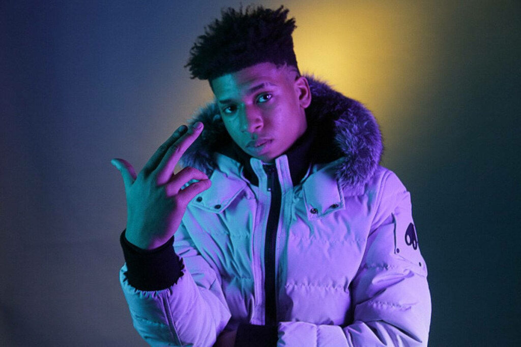Purple Reign: Nle Choppa's Aesthetic Look Takes Center Stage in Wallpaper