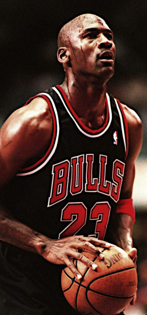 Mastering the Art of Jump Shots: Michael Jordan's Timeless Impact on Basketball Wallpaper