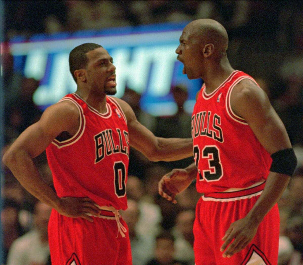 Defying Gravity: Michael Jordan's Iconic Drive to the Hoop in the NBA Wallpaper