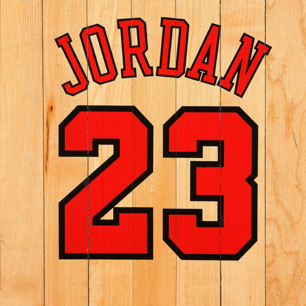 Legendary Michael Jordan: The Iconic NBA Superstar Strikes a Winning Pose Wallpaper