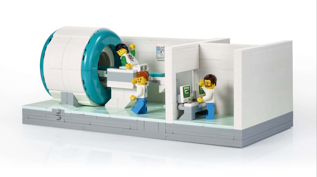 Lego hospital scene with MRI machine and medical team in detailed miniature creative wallpaper