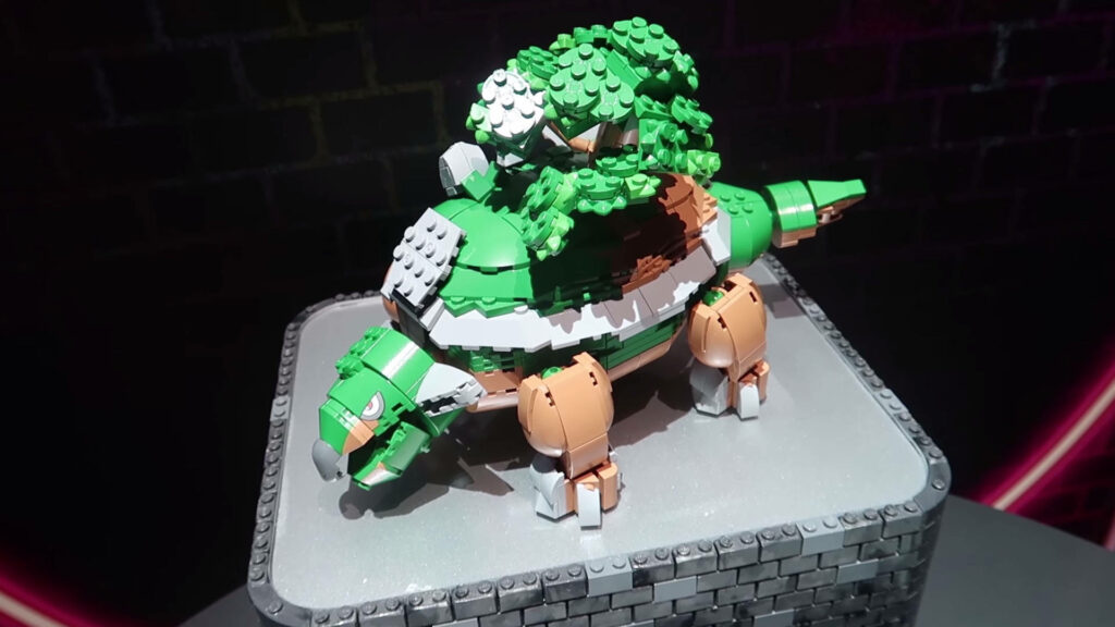 Creative Lego Torterra model with detailed green foliage and earthy tones on wallpaper background