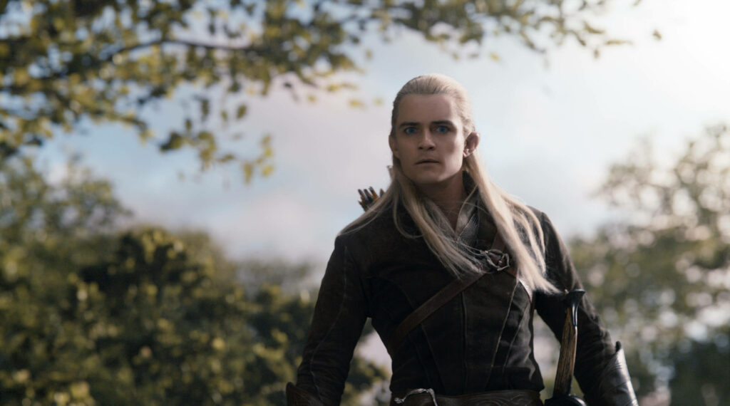 Legolas Unleashed: Orlando Bloom's Blonde Locks in Stunning English Actor Wallpaper