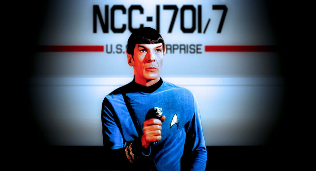 Leonard Nimoy as Spock: Iconic Starfleet Wallpaper with USS Enterprise
