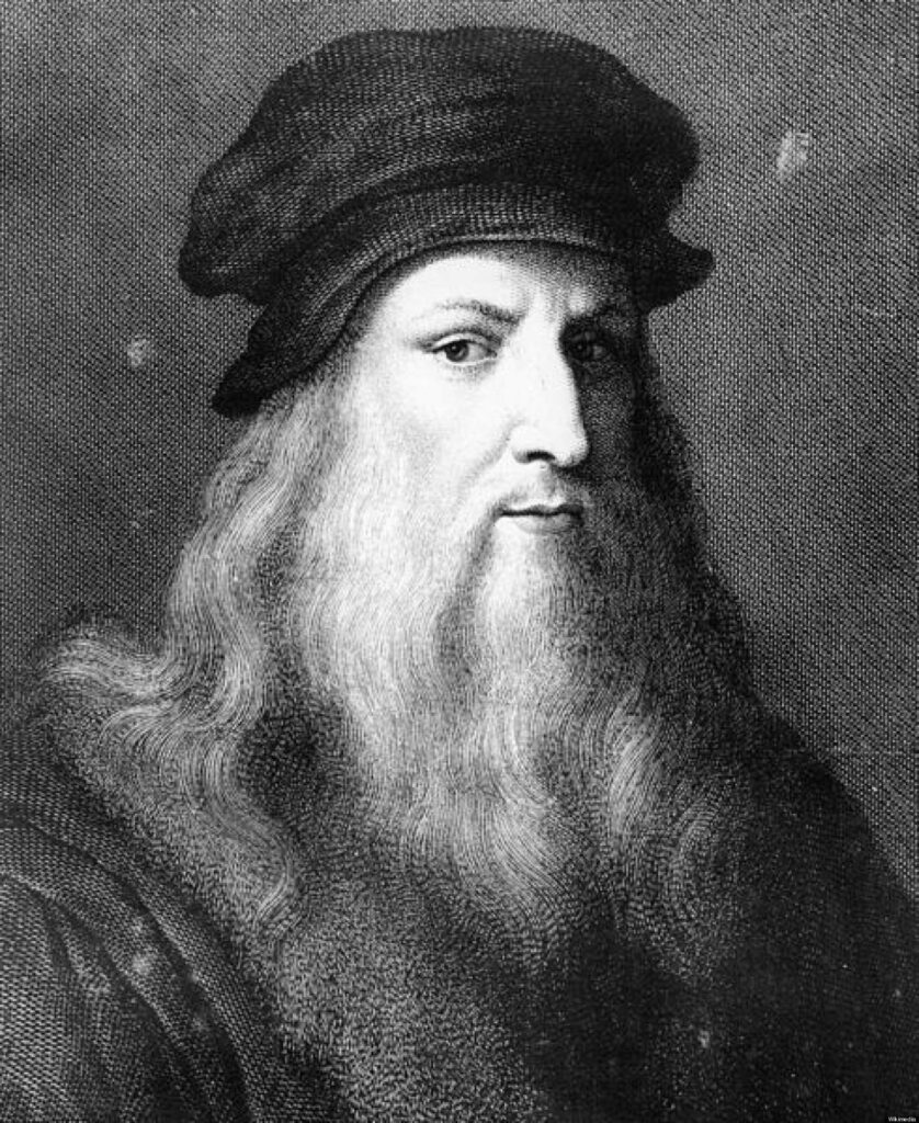 Greyscale detailed portrait of Leonardo Da Vinci with thoughtful expression and iconic beard wallpaper