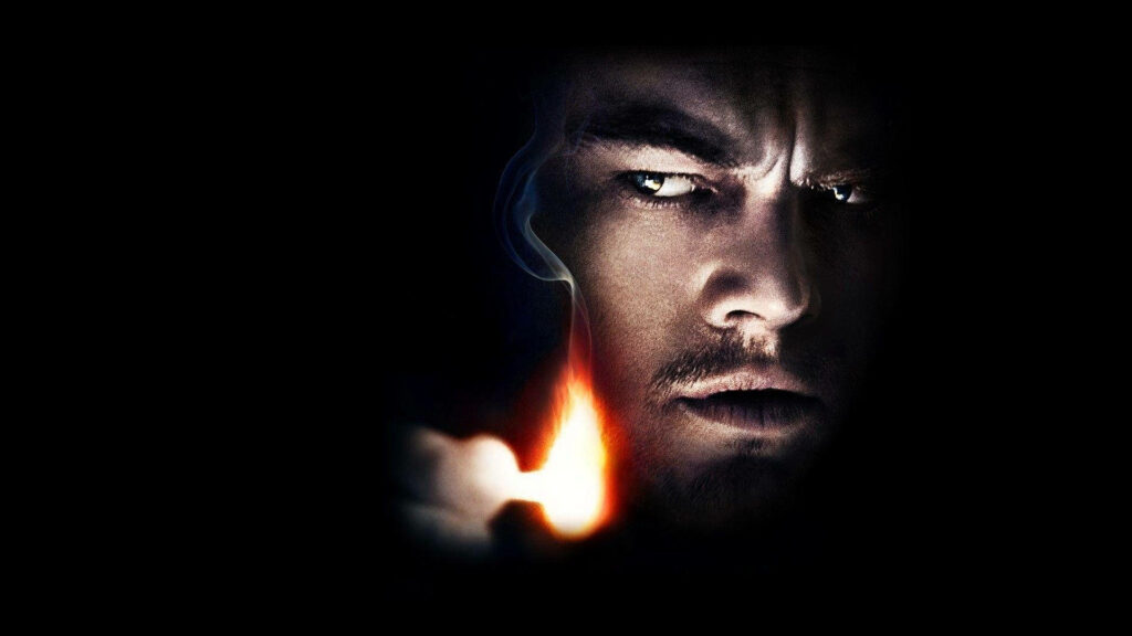 Intense Shutter Island Wallpaper: Leonardo DiCaprio in Warm Glow
